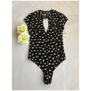 Free People Twist-Neck printed tong Bodysuit